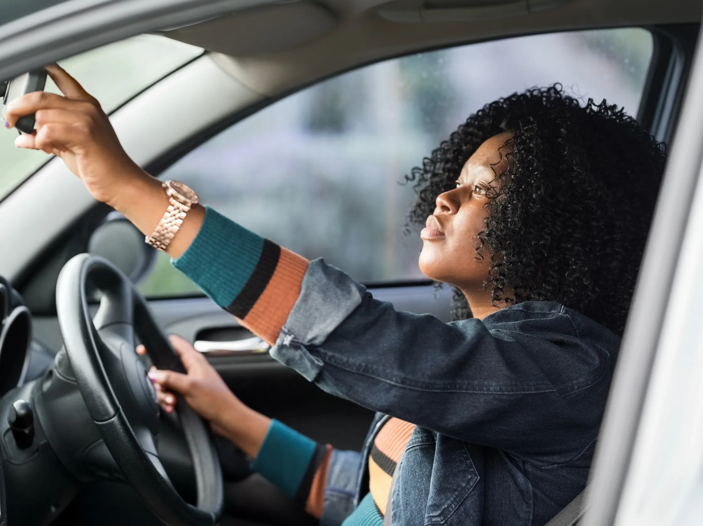 Person reviewing documents in preparation for their OT driving assessment